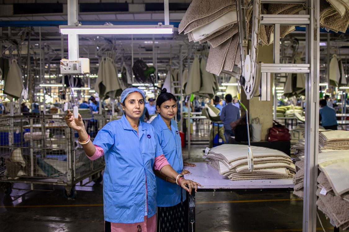 Two women at work in an Indian textile factory